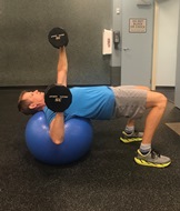Single-arm Chest press while on ball