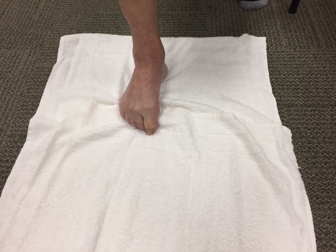 Toe stretches with towel