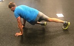 Plank with knee to opposite elbow