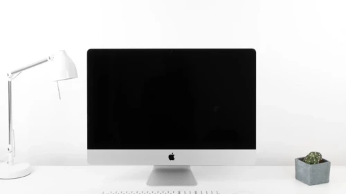 Apple computer on a desk | Working from home