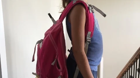 Carrying a backpack safetly