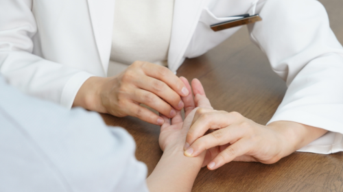 Orthopedic doctor explaining to patient Early Arthritis Treatment Options That Keep You Active and Pain-Free