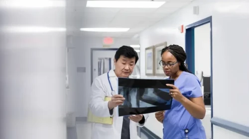 physicians looking at x-ray together