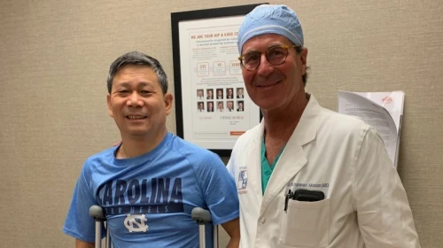 Hip and Knee surgeon J. Bohannon Mason examines Joshua