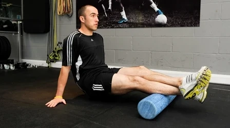 Patient using a foam roller