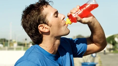 Man drinking sports drink