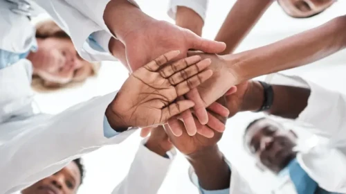 medical staff team high five