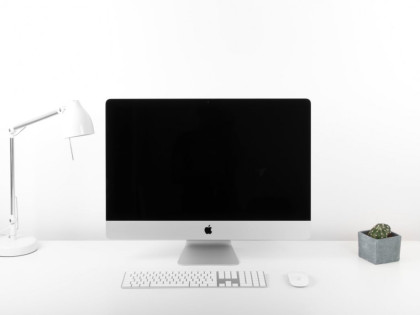 Apple computer on a desk | Working from home