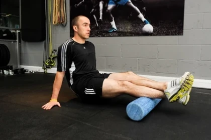 Patient using a foam roller