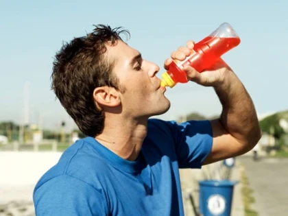 Man drinking sports drink