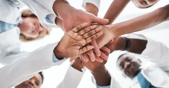 medical staff team high five