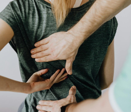 Doctor Checking Spine