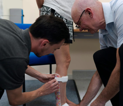 Doctors Working on Ankle