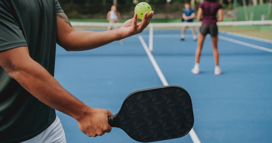 Playing pickle ball.
