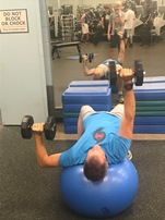 Single-arm Chest press while on ball