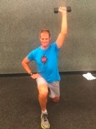 Reverse lunges with arms high