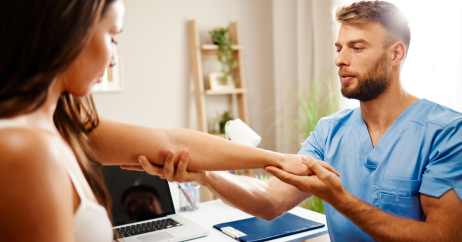 Orthopedic specialist with patient