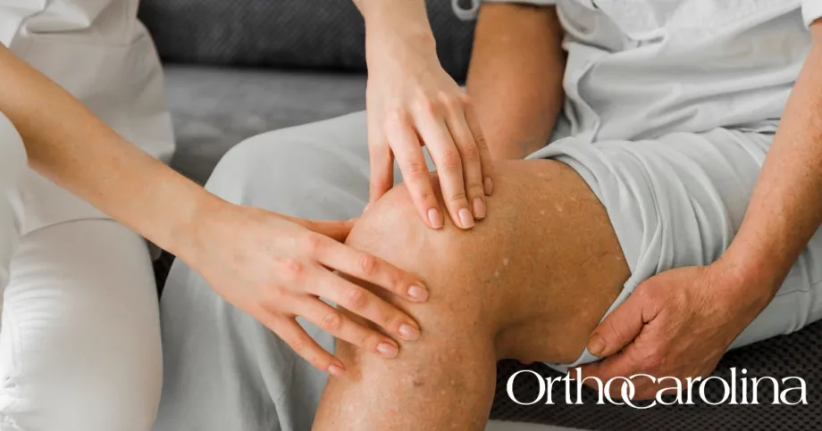 Orthopedic specialist with patient