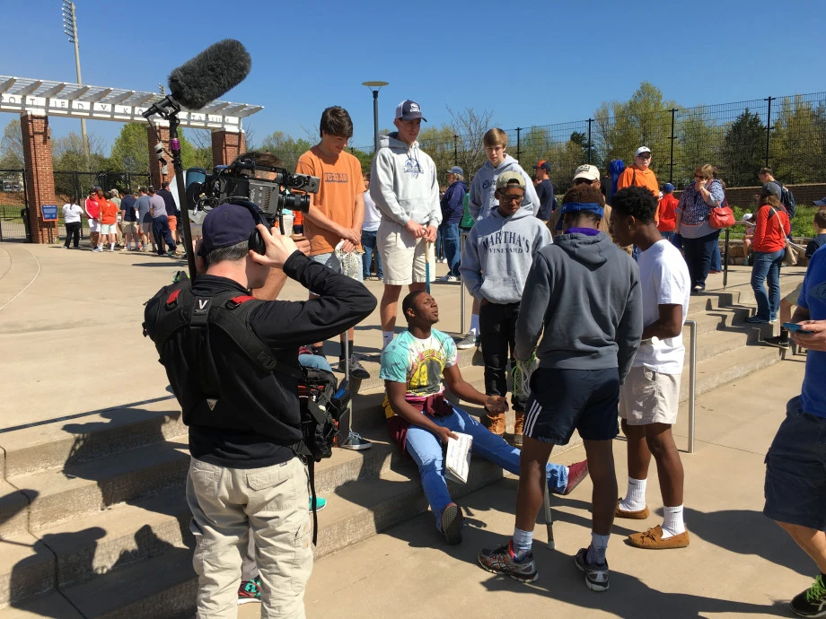 An ESPN documentary crew with the Charlotte Secondary School lacrosse team