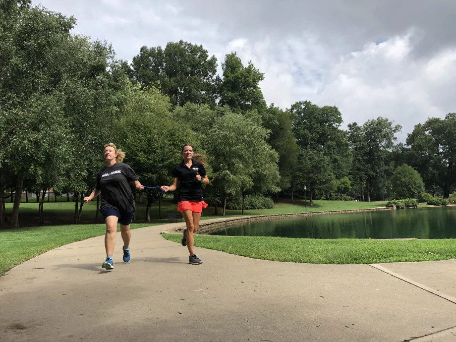 Julie running at Freedom Park with Para Guide co-founder Shannon Houlihan