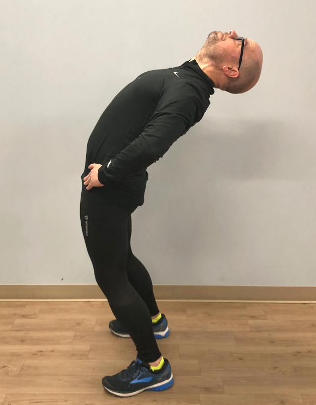 STANDING REPEATED  LUMBAR EXTENSIONS