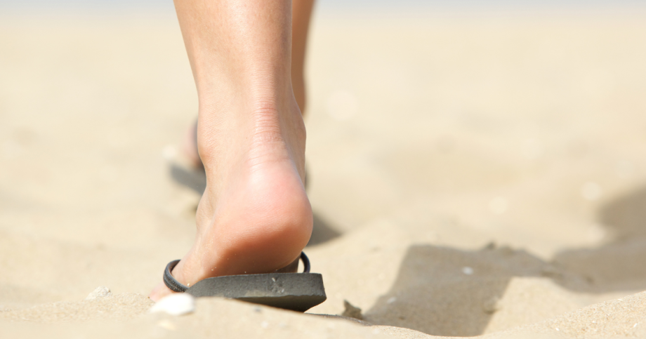 Walking in flip-flops.