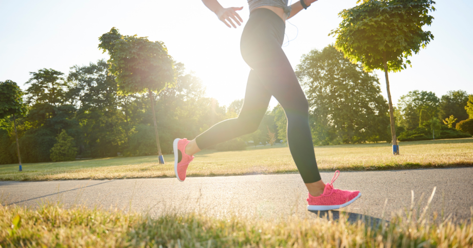 Woman exercising outdoors during spring
